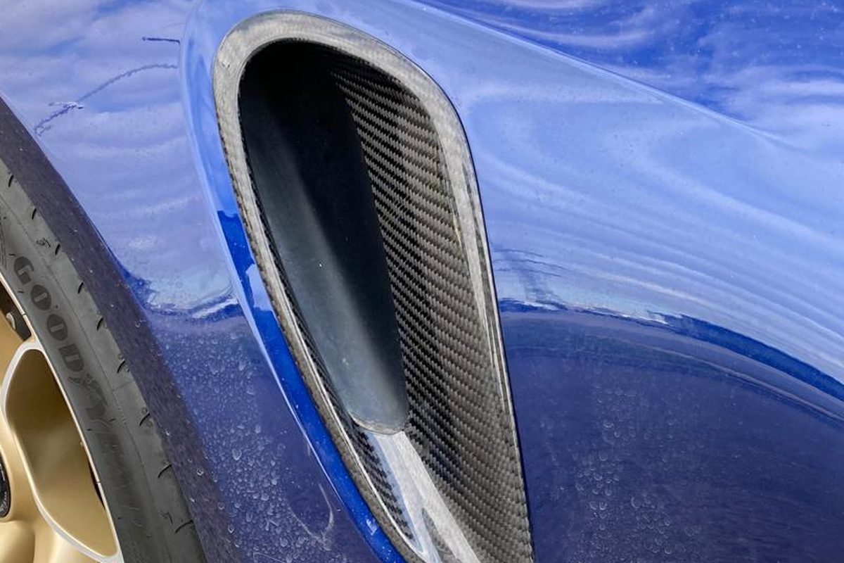 Carbon fibre side intake fitted to a sports car