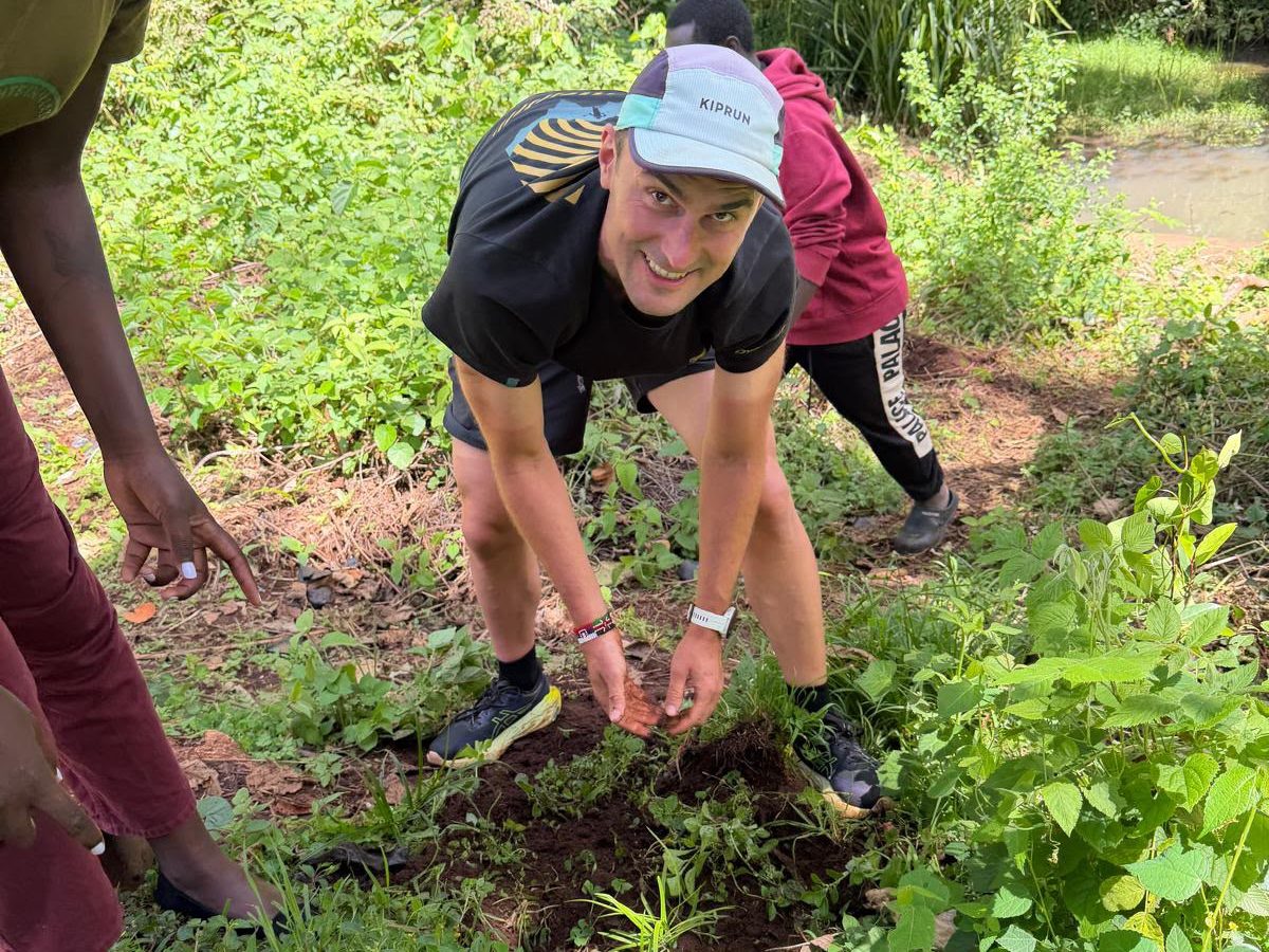 Michal planting a tree in Iten, Kenya